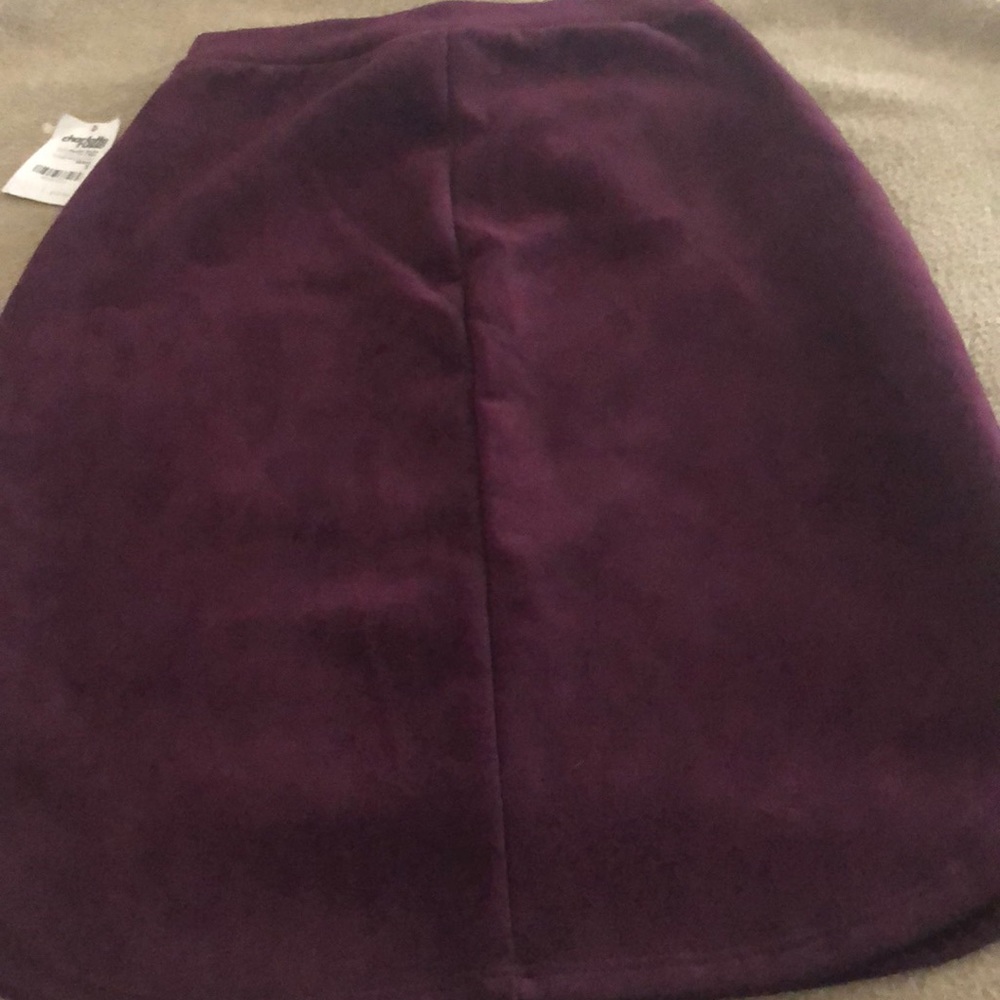 Small purple skirt.